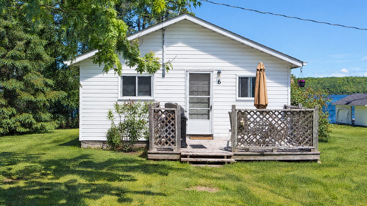 Cottage 6 with its decks near the water