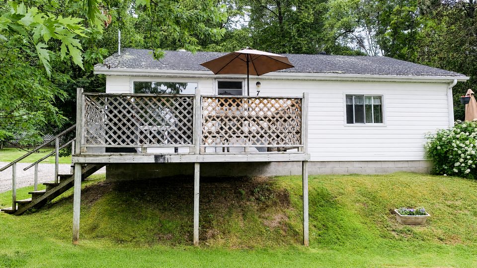 Eagle's Nest and its raised deck with a patio umbrella