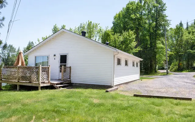 Lake Lookout and its deck on a sunny lawn