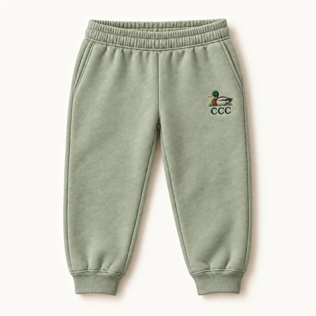 CCC Essentials Kids’ Sweatpants in Light Green, front, product concept