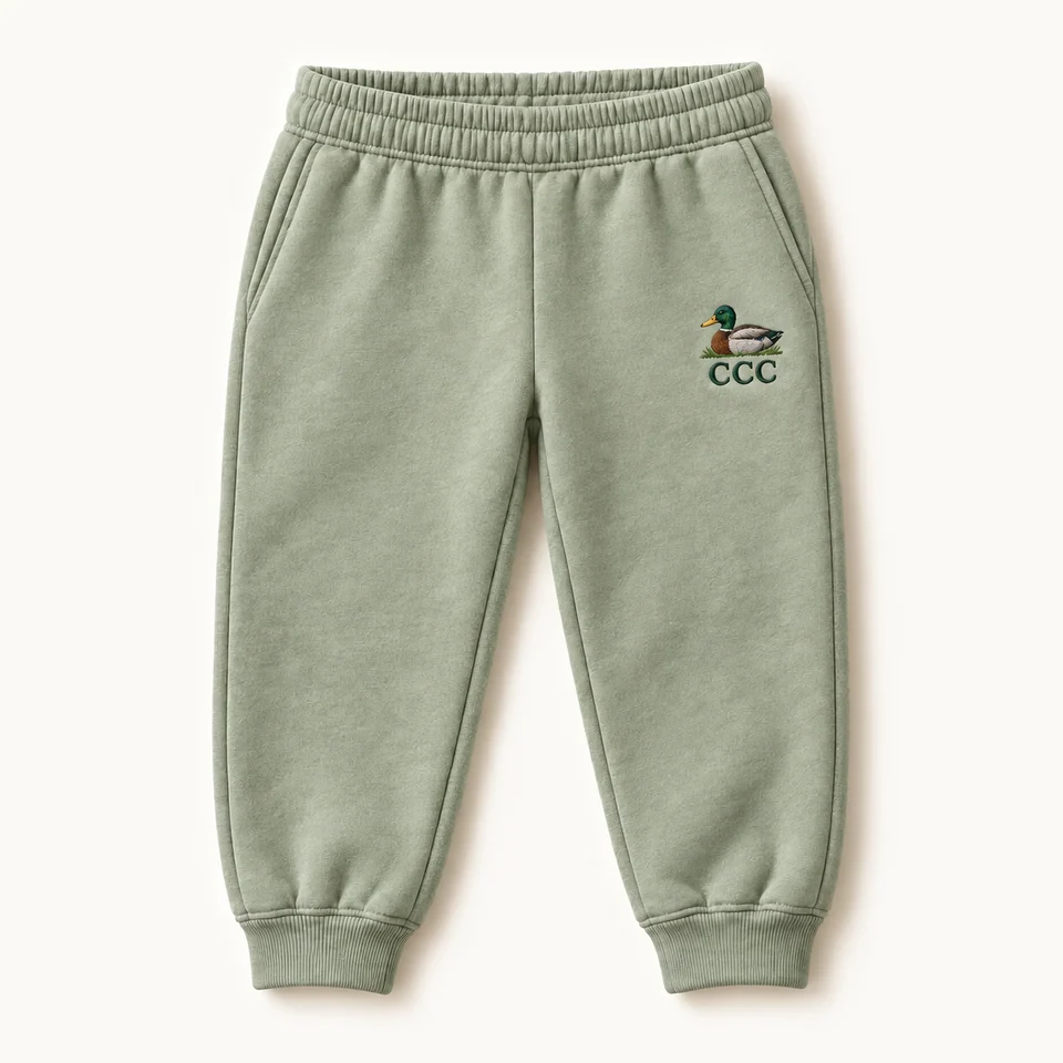 CCC Essentials Kids’ Sweatpants in Light Green, front of the garment, product concept